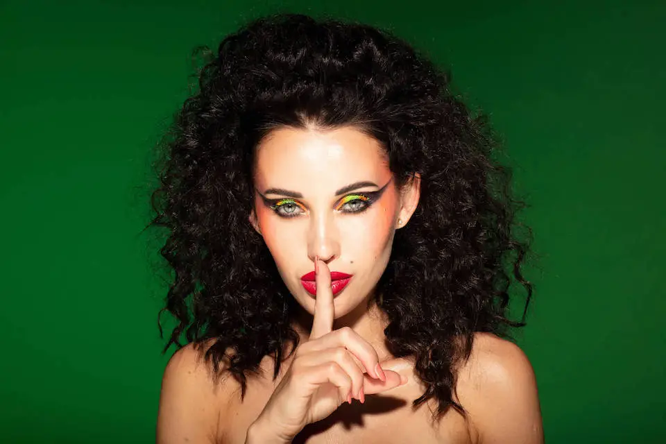 Creative 80's fashion makeup by Natalia Goff.