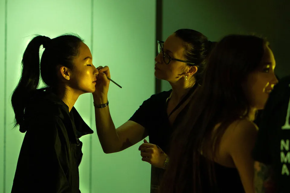 Natalia Goff during a makeup session at Paris Fashion Week.